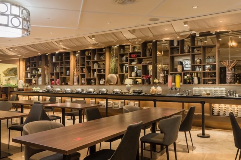 Adele Dining restaurant interior with set tables