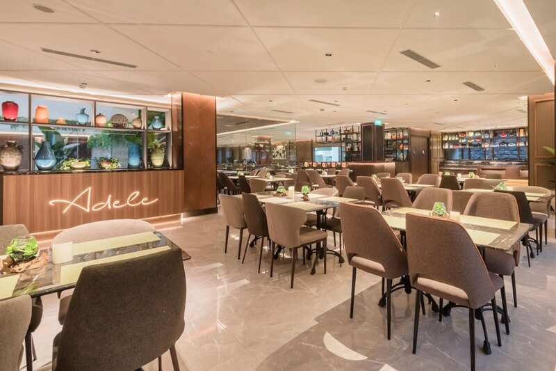 Interior of Adele Dining with elegantly set tables