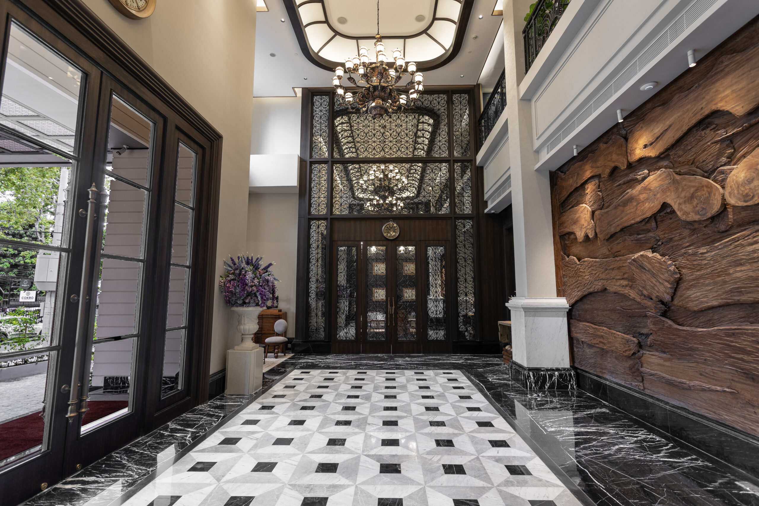 Luxurious Ashley hotel lobby with marble floor and wood wall