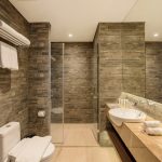 A bright, modern bathroom with a freestanding tub