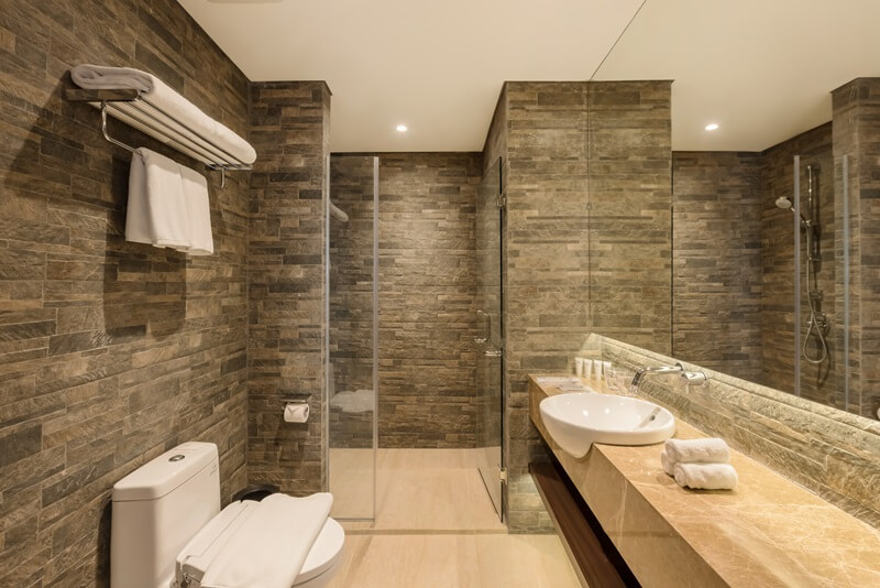 A bright, modern bathroom with a freestanding tub
