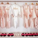 White Bride and Groom bathrobes hanging in a bridal room