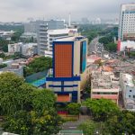Aerial view of the Ashley Tugu Tani hotel facade