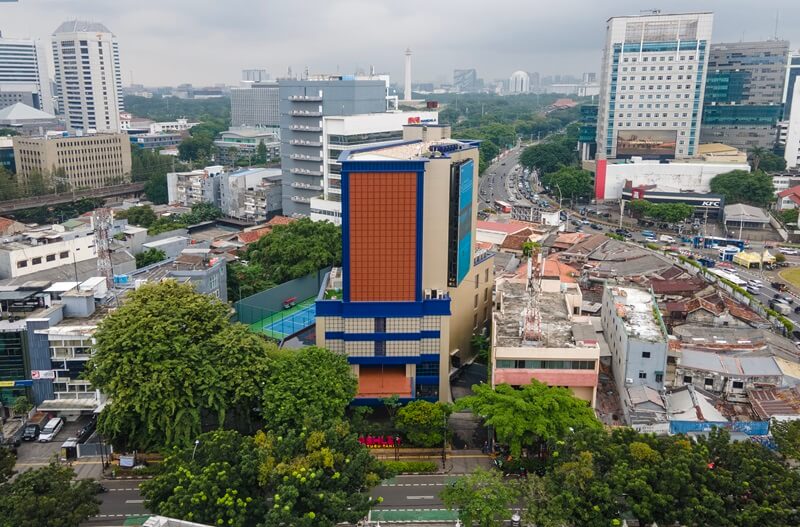Aerial view of the Ashley Tugu Tani hotel facade