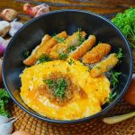 A plate of Nasi Nugget Telur Omahmi