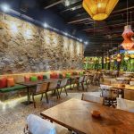 Outdoor restaurant patio with tables and chairs