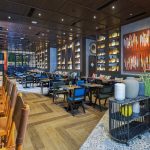 Bright, modern restaurant interior with dining tables