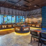Modern hotel restoran dining area with set tables