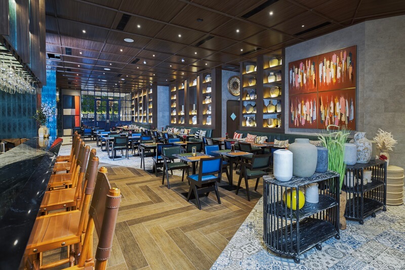 Bright, modern restaurant interior with dining tables