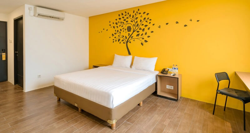 A modern Superior Double hotel room with a large bed