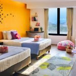 YB1 Girls Room with twin beds and a colorful mural