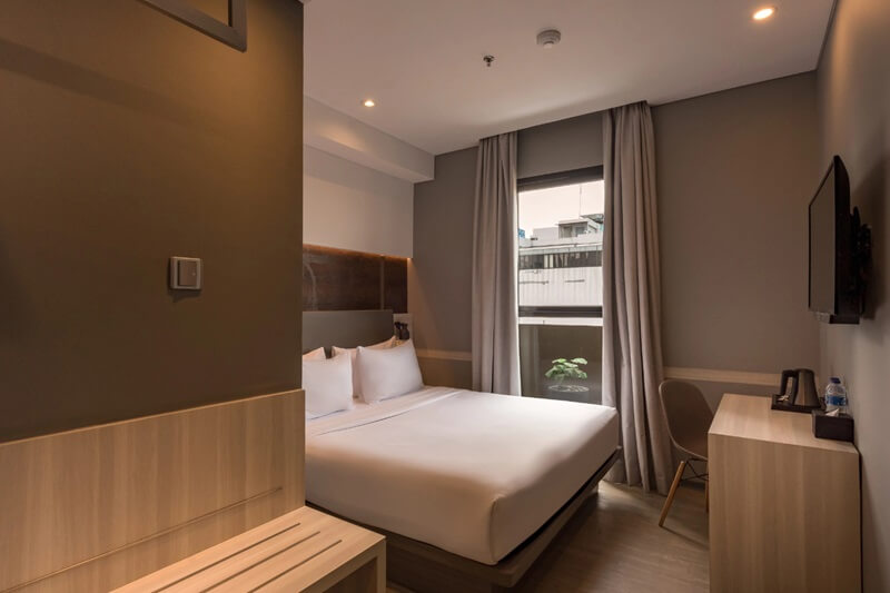A clean and modern deluxe double hotel room