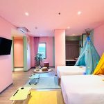 A modern deluxe thematic hotel room with a large bed