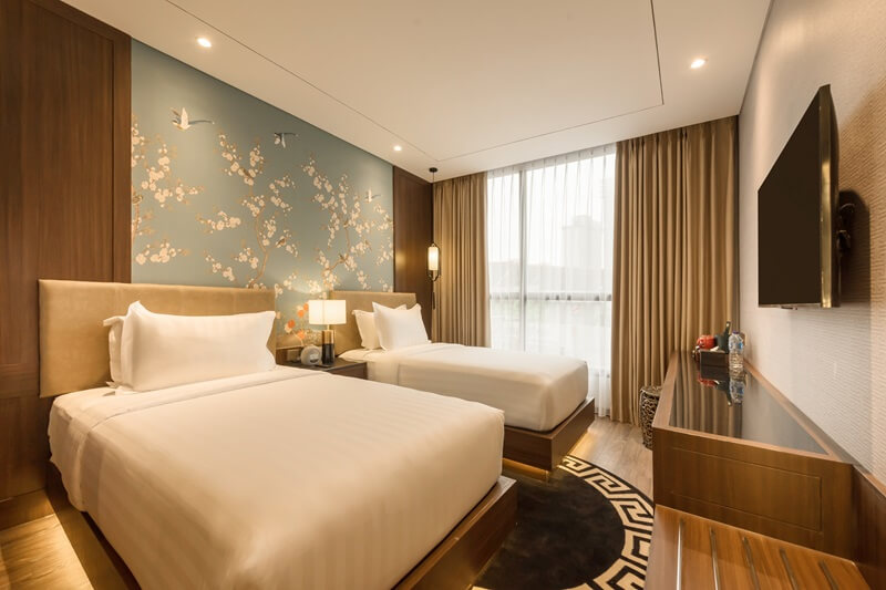 Deluxe twin hotel room with two beds