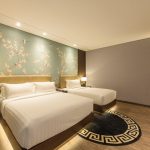 Deluxe Triple hotel room with three single beds