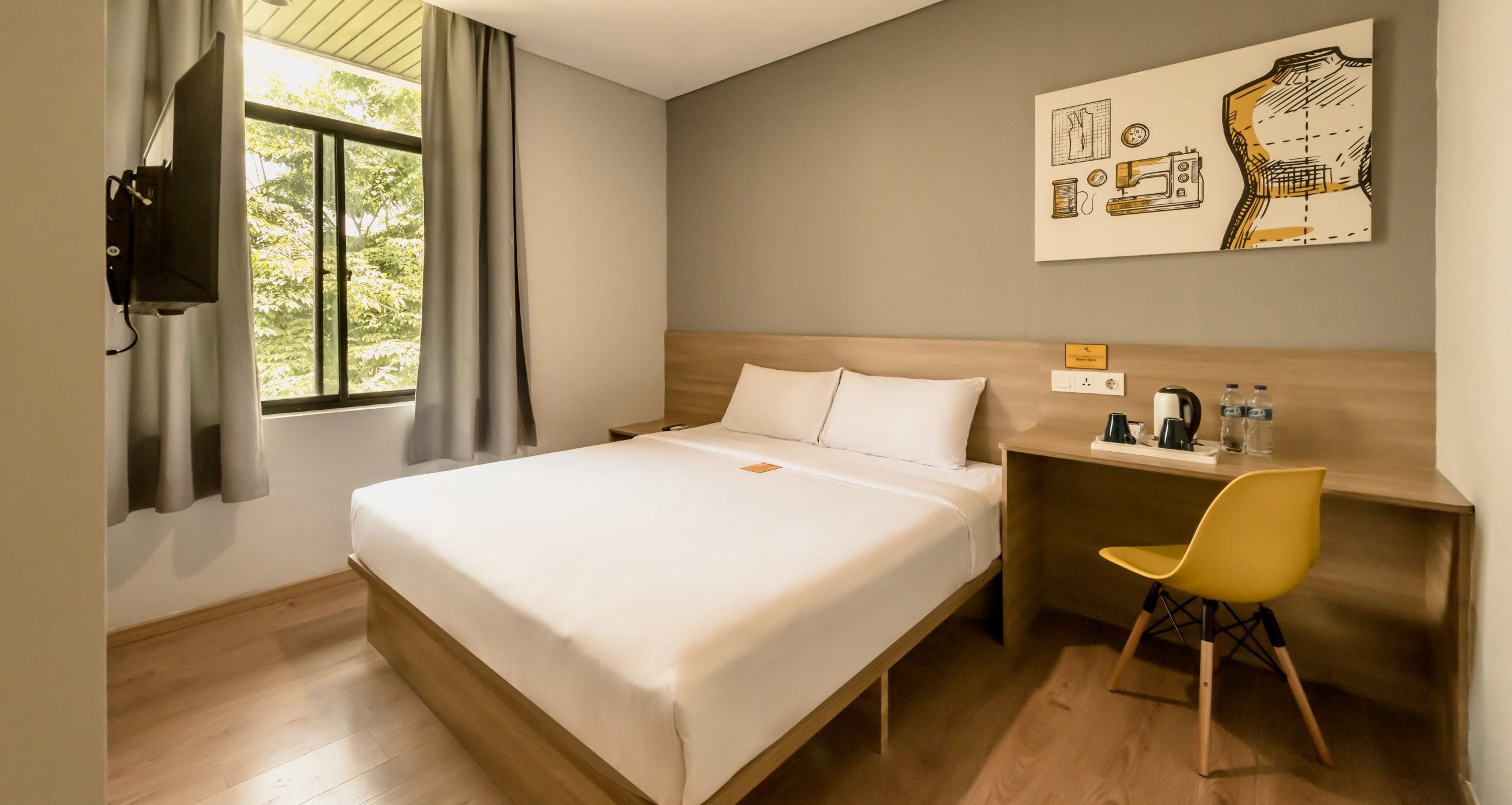 Ashley Hotel Group's modern Deluxe King room