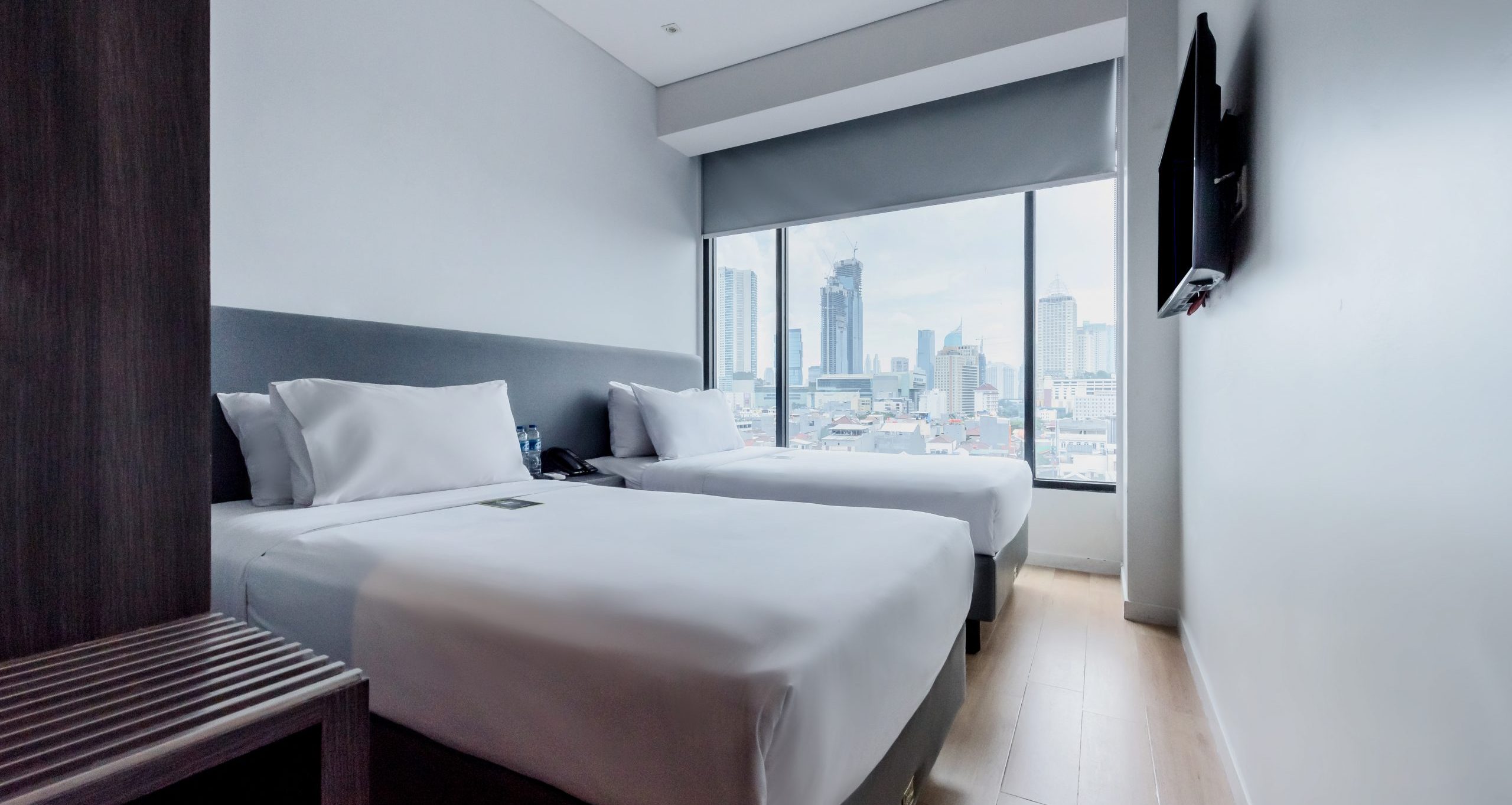 Deluxe Twin room with two beds at Juno Tanah Abang