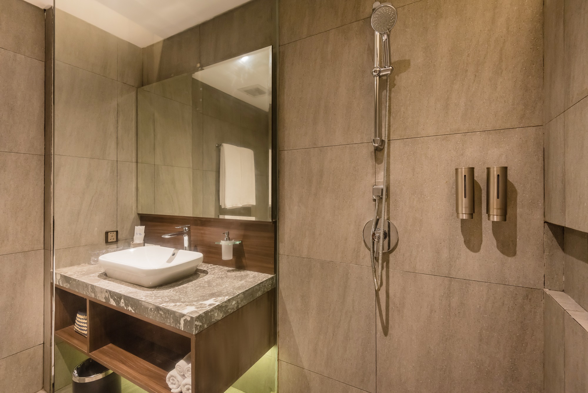 Modern hotel bedroom at Ashley Hotel Group