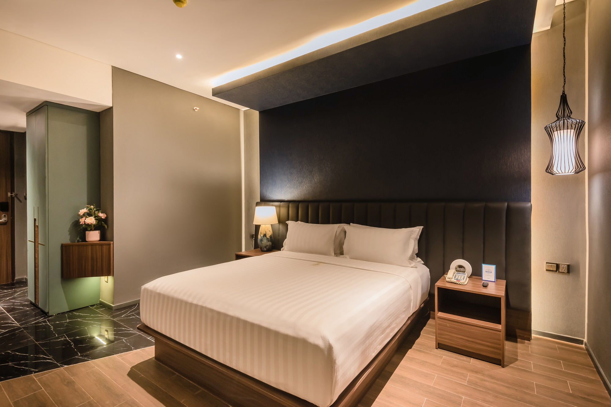 Modern guest room at Ashley Hotel Group