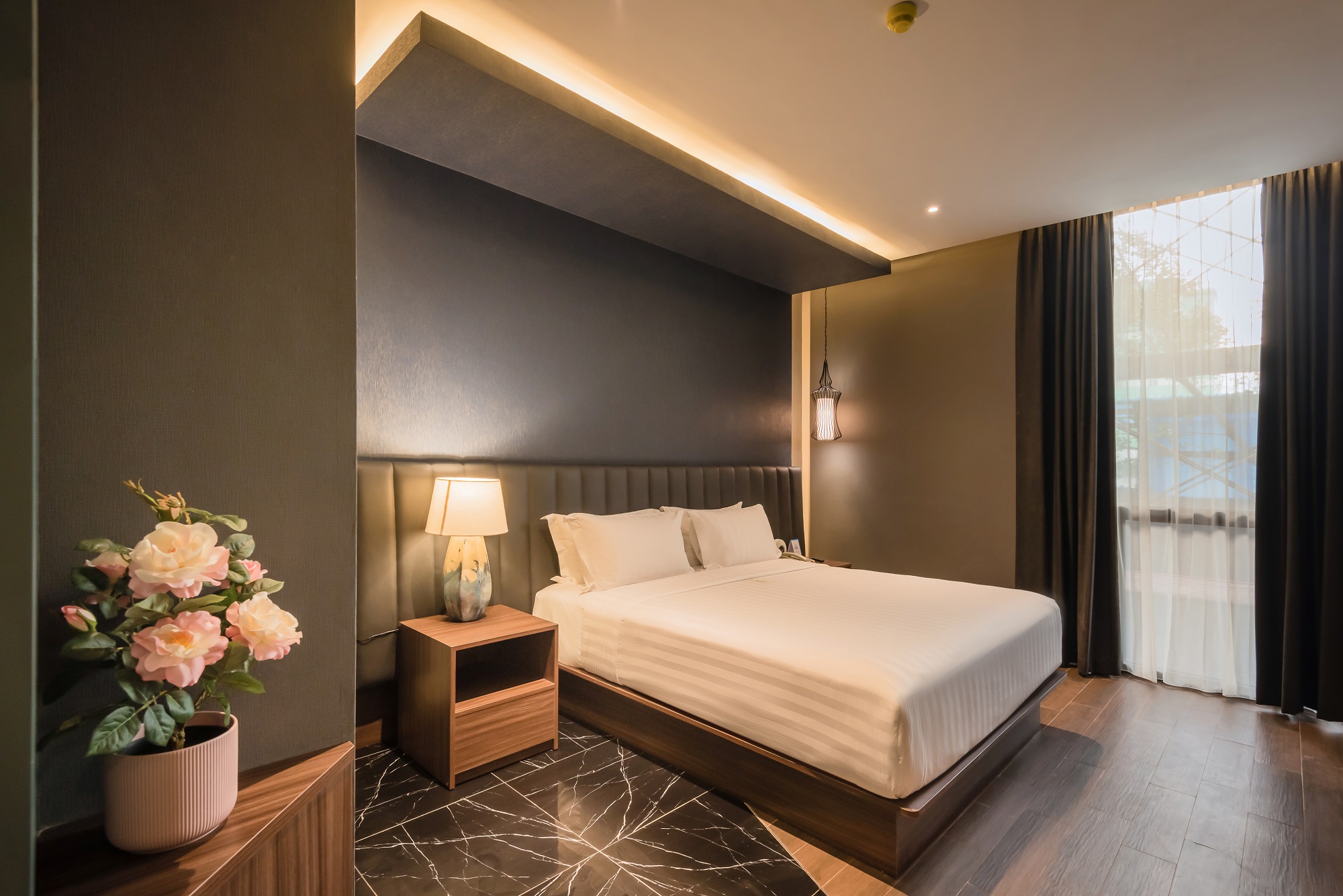 Bright and modern Ashley Hotel Group guest room