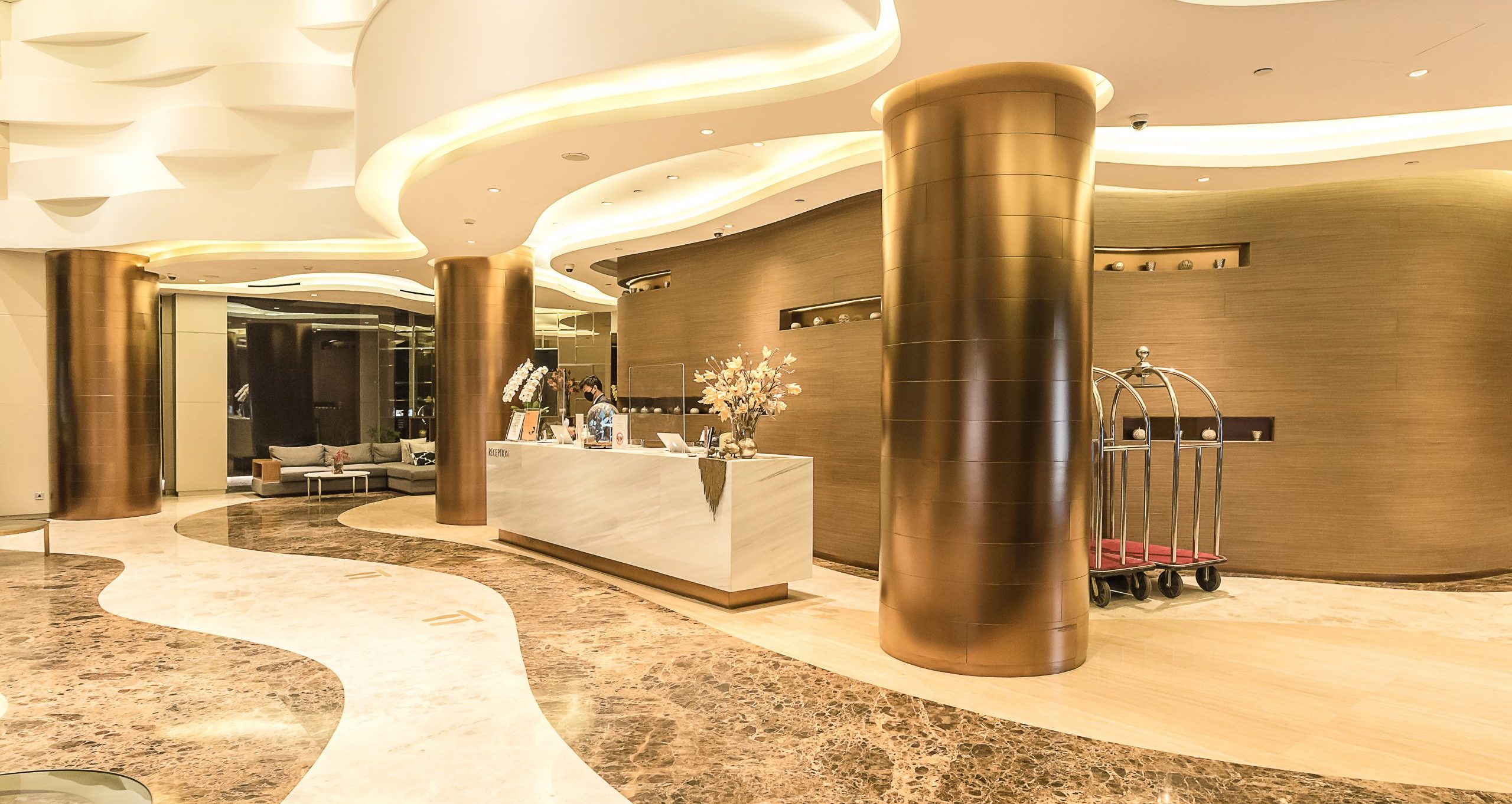 A modern, comfortable hotel room at Ashley Hotel Group