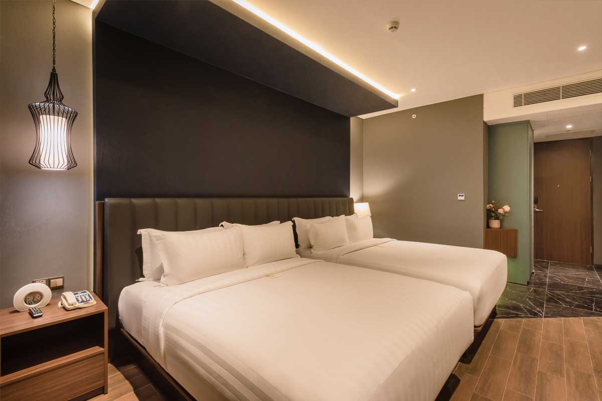 Ashley Hotel Deluxe Triple Room with three beds