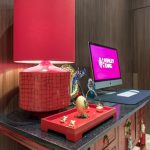 Ashley Hotel Group room corner with a chair and table