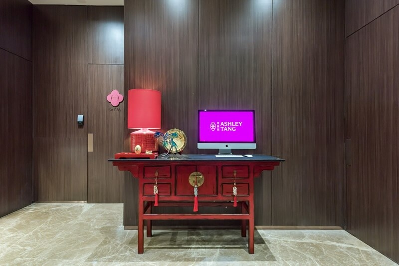 E-corner with a chair and lamp at Ashley Hotel Group