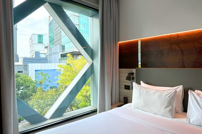 A modern executive double hotel room with two beds