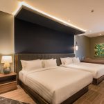 A modern Executive Twin room with two single beds