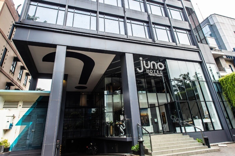 Exterior of the modern Juno Hotel building