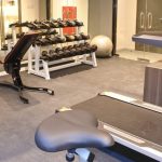 Hotel fitness centre with treadmills and weight machines