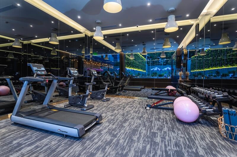 A modern fitness centre with treadmills and equipment