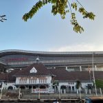 The classic white facade of Jatinegara Train Station