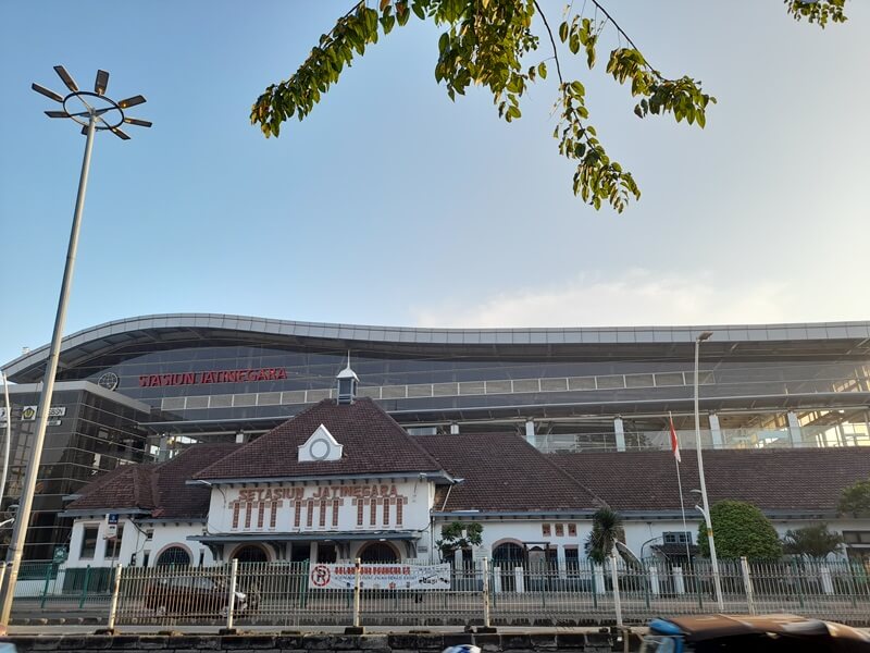 The classic white facade of Jatinegara Train Station