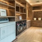 Guest laundry room at Ashley Hotel Group with washers
