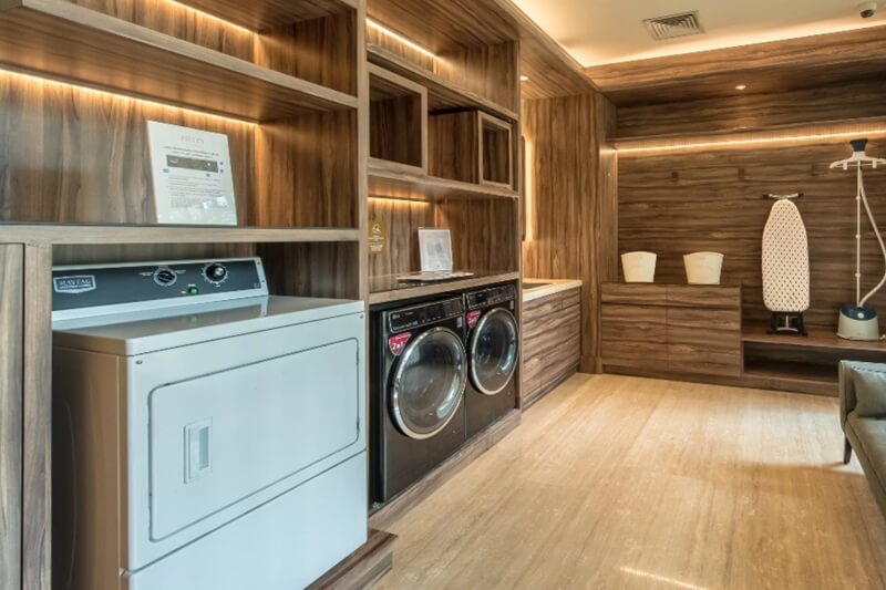 Guest laundry room at Ashley Hotel Group with washers