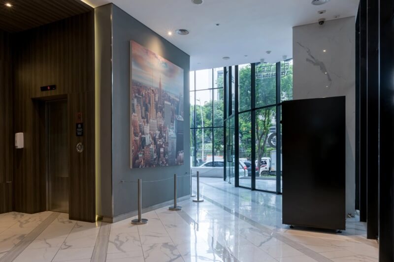 Modern hotel lobby area with a reception desk