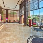 Modern lobby area of the Ashley Hotel with seating