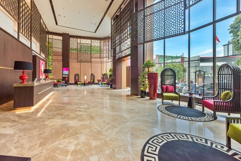 Modern lobby area of the Ashley Hotel with seating