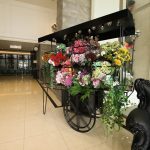 A stylish lobby corner with a modern armchair and plant