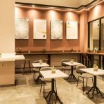 A modern hotel lobby lounge with comfortable seating