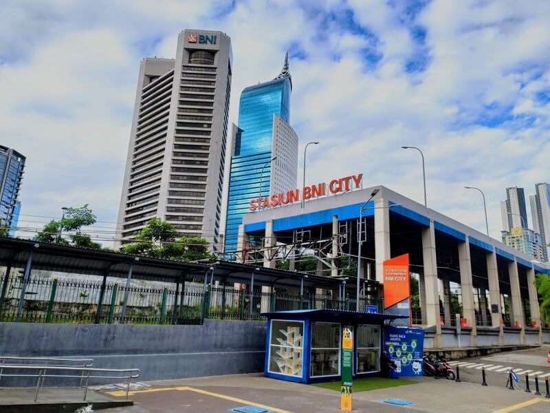 Underground MRT station with a train at the platform
