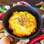 Nasi Telur Omahmi with a sunny-side-up egg
