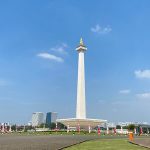 The National Monument of Indonesia under a blue sky