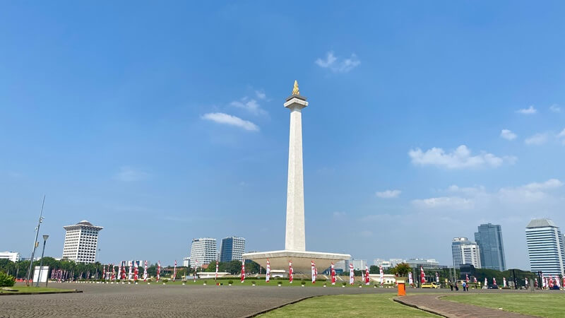 The National Monument of Indonesia under a blue sky