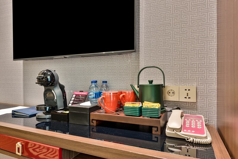 Close-up of hotel room amenities on a white tray