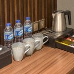 Hotel room amenities including soap and a toothbrush