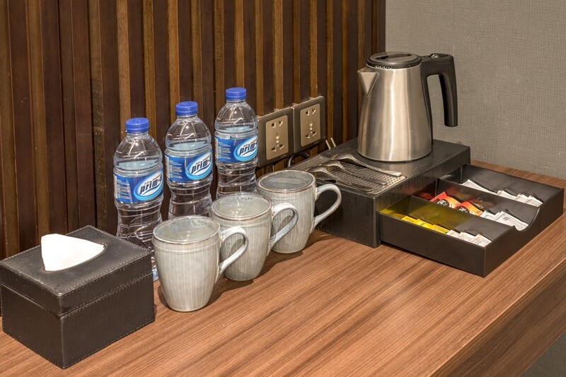 Hotel room amenities including soap and a toothbrush