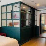 Modern interior of hotel room10 with a large bed